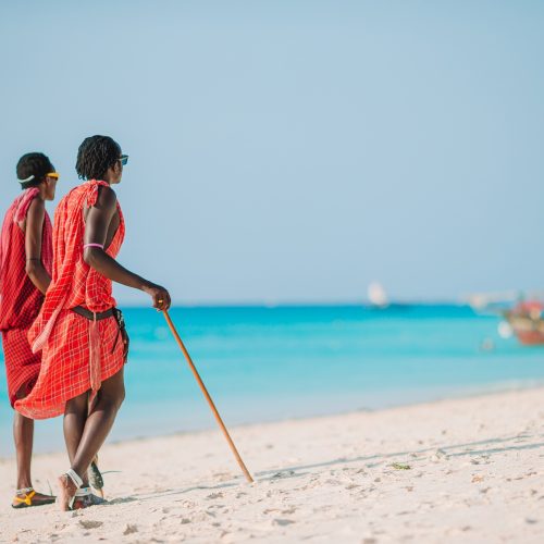 masai tribe member standing near the ocean in Zanzibar 11 February 2016